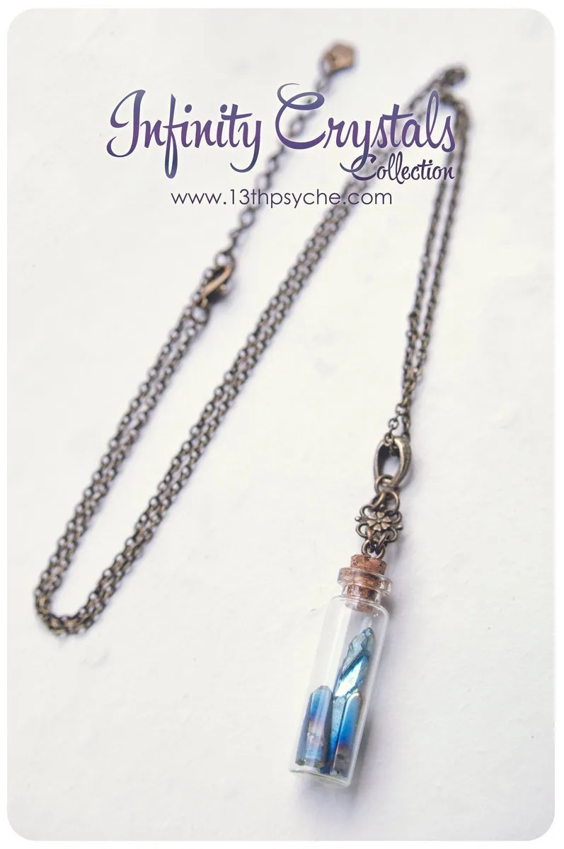 Glass vial pendant necklace with pointed crystal