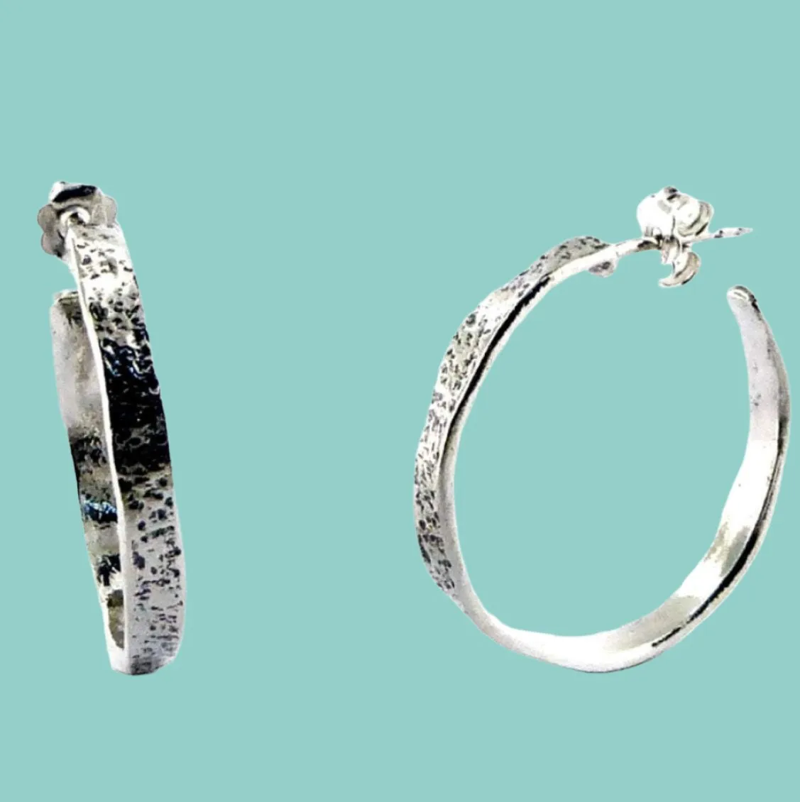 Silver hoop earrings thin by Israeli designers